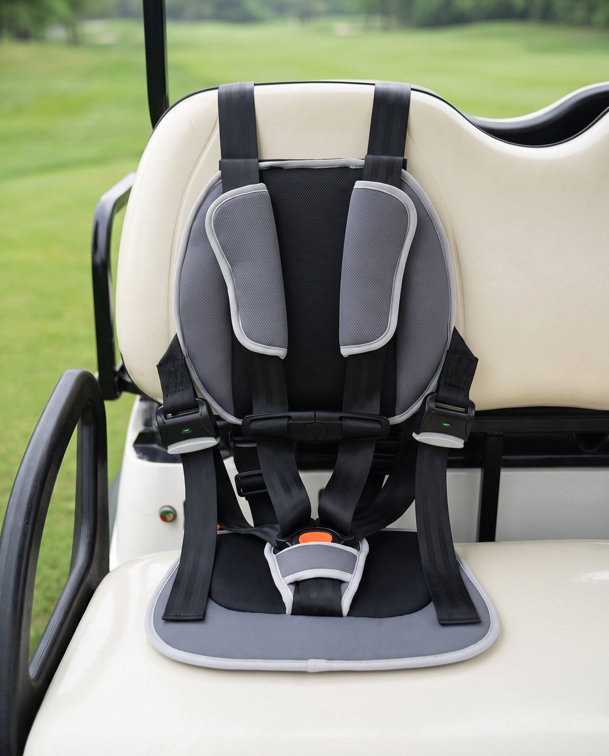 CubRide harness installed on a golf cart bench seat, showing all five strap points